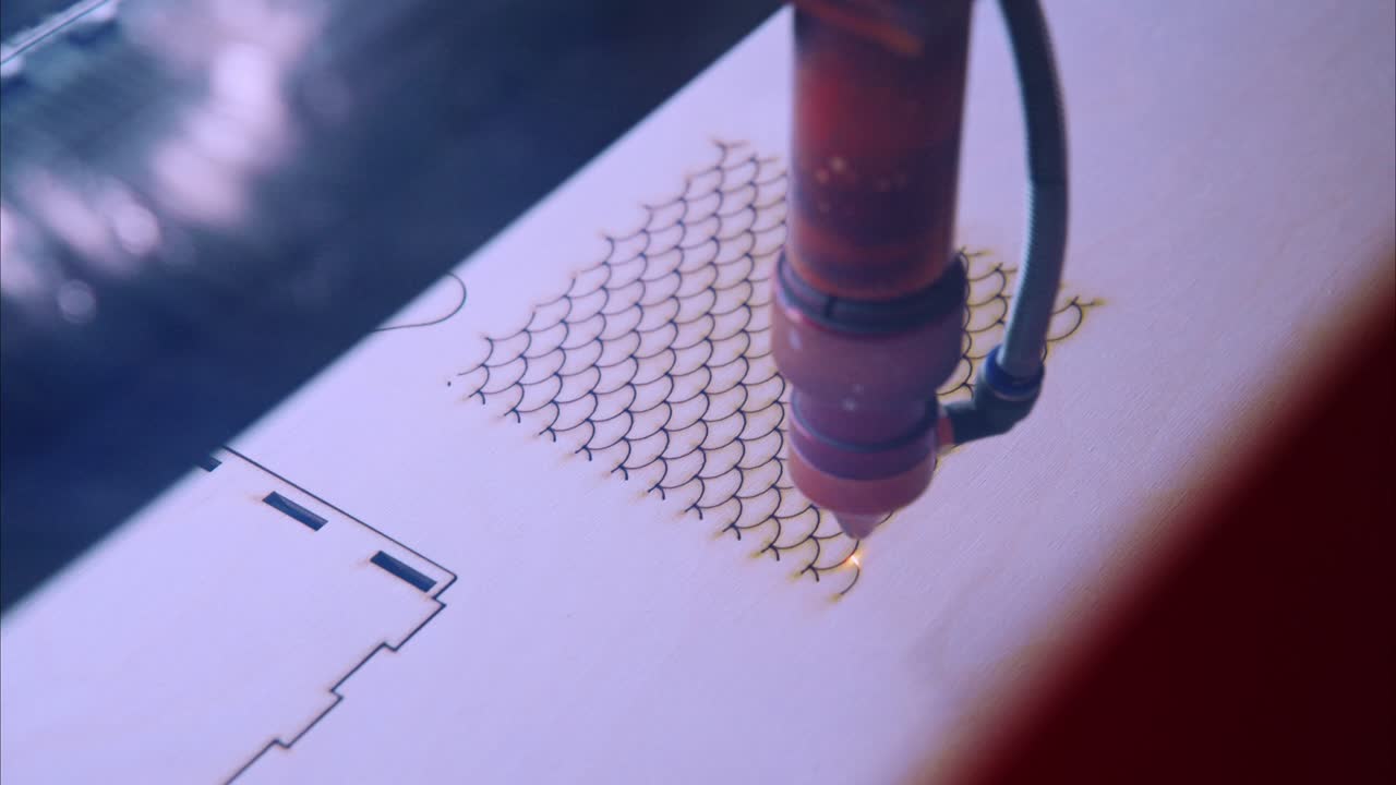 Laser Engraving Machine Creating Pattern on Wood