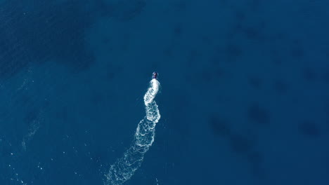 aerial top shot of a jet ski mediterranean sea france blue water sunny day