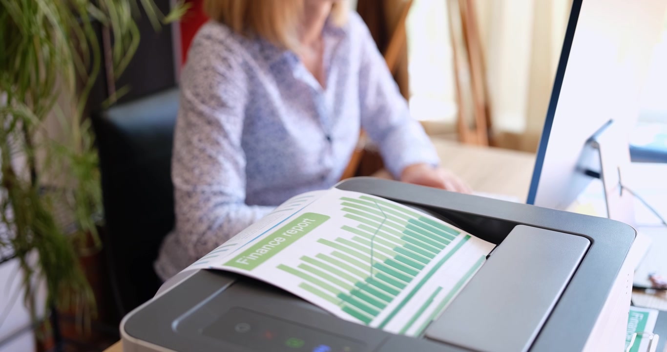 A modern office with a printer and business analytics tools for better productivity and efficiency