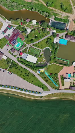 aerial view of a resort with pools and recreational facilities