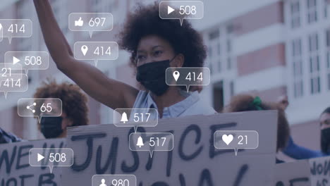 animation of media icons over diverse people with face masks raising hands and protesting