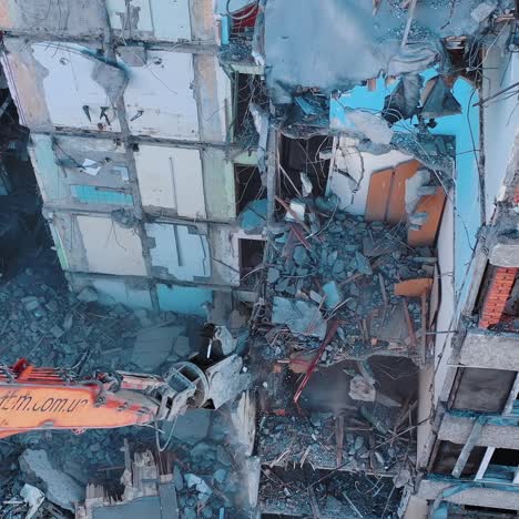 destroying old building. destroying large old house with special machine