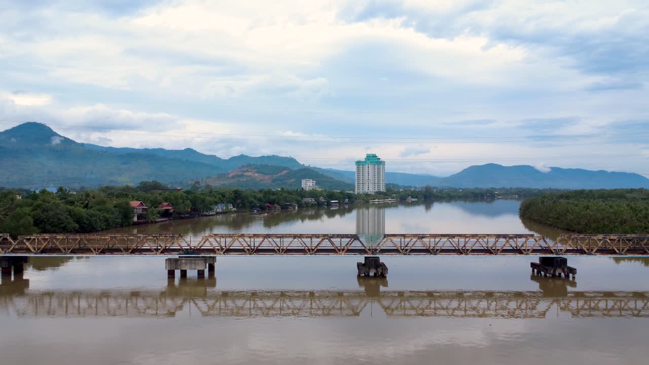 Old railway bridge in Kampot Cambodia over the Praek Tuek Chhu River, aerial drone