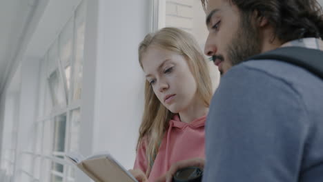 students studying in a school corridor