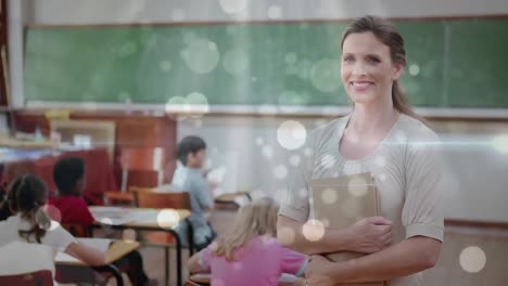 teacher in the classroom surrounded by light circles