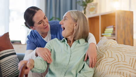 caregiver assisting elderly woman at home