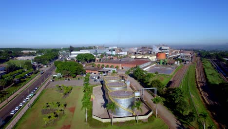 Aerial-flyover-of-a-cotton-factory-in-Brazil-on-a-sunny-day