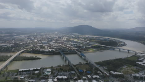 static drone timelapse of the north shore of chattanooga looking towards downtown and lookout mountain on a cloudy day.