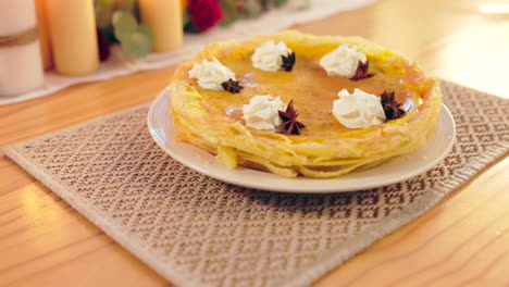 crepe cake, pastry and dessert on table with cream