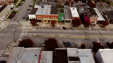 areal pan shot of a downtown main street in a small mid-west town in ohio in the fall