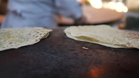 cooking flatbread on a griddle