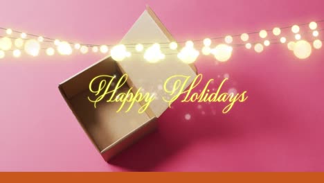 ハッピー・ホリデー・テキストのアニメーション クリスマス・ライトとボックス