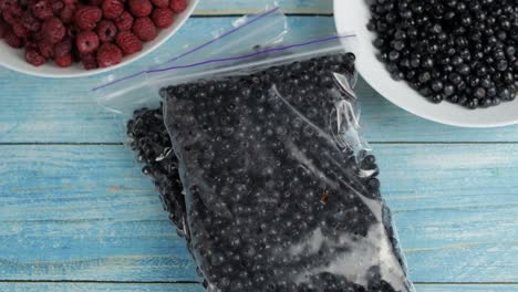 Packages-with-blueberries-in-zipper-plastic-bags-for-freezing.-Frozen,-preservation-berries-food