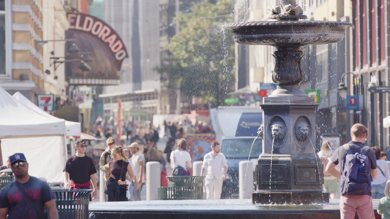 Torggata famous pedestrian street in Sentrum Oslo with people sightseeing, slomo