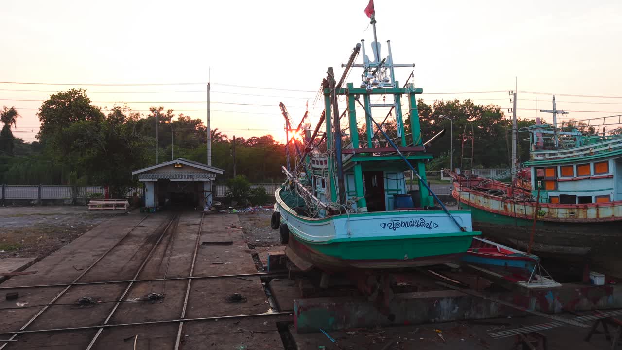 Fishing Boat Under Repair at Sunset