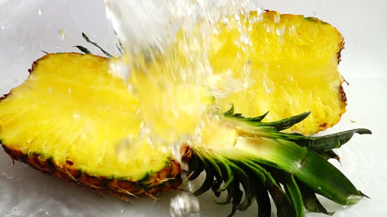 Fresh ripe pineapple. Slow motion.