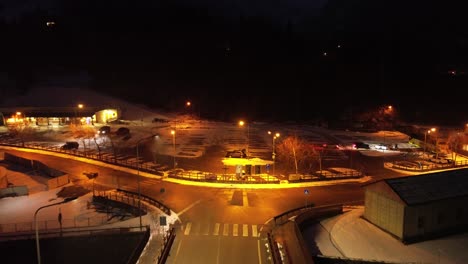 the roads are magical, but seen by a drone over the mountain with illuminated lights show the beauty of olympic winter games