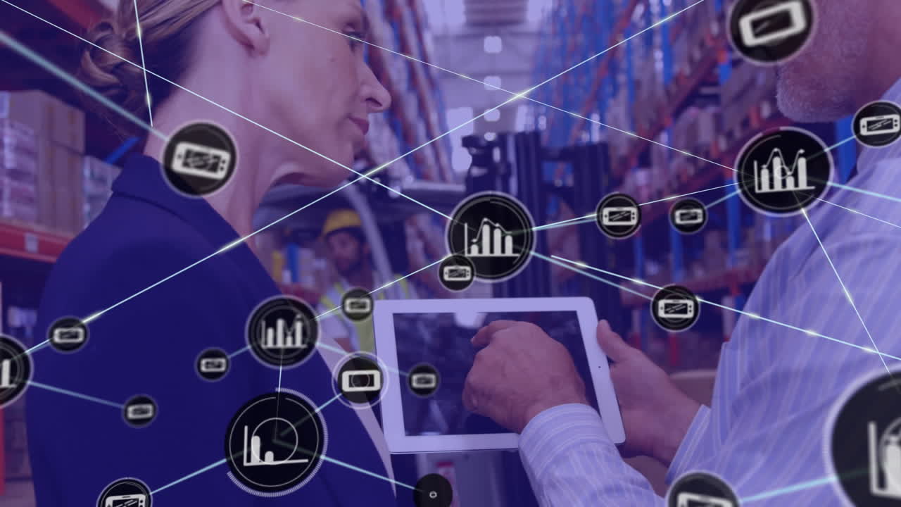 red de iconos digitales sobre un supervisor caucásico masculino y femenino usando una tableta digital en el almacén