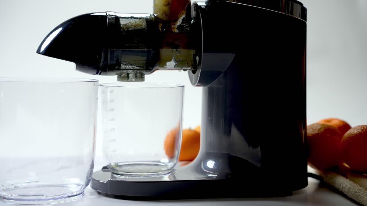 Glass measuring container, delicious homemade drinks, fruity pulp