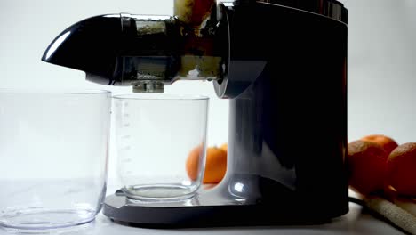 glass measuring container, delicious homemade drinks, fruity pulp