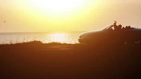sunset road trip in a convertible