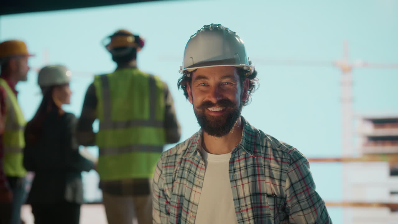Smiling Construction Worker in Hard Hat at Job Site