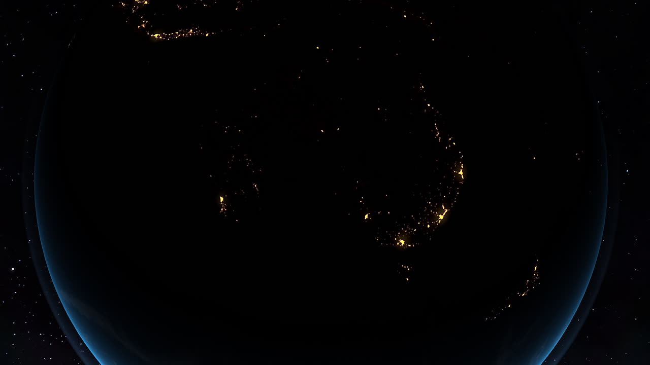 우주에서 볼 수 있는 오스트레일리아의 빛나는 도시 불빛의 야간 풍경, 그 주변을 둘러싸고 있는 광대한 어을 보여준다.