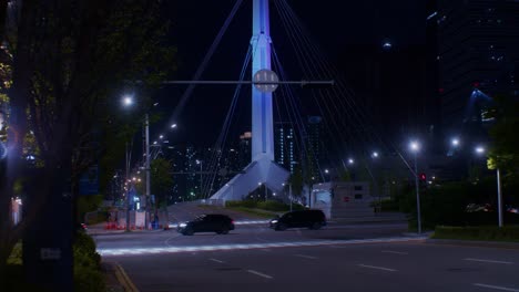 night city town urban park with road, cars, architecture and buildings with skyscrapers and lights outdoors on the street wide angle view with traffic