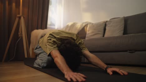 man doing push-ups at home