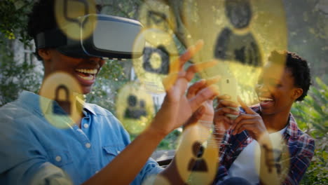 yellow icon with two women wearing vr headset