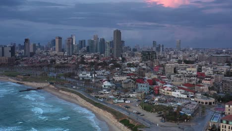 tel aviv cityscape at sunrise/sunset with cloudy sky