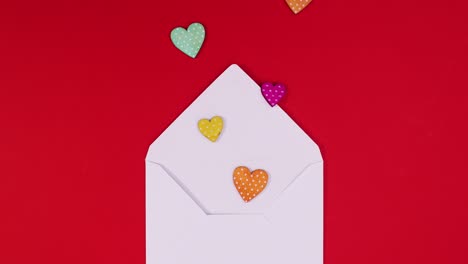 looping stop motion animation of hearts come out of envelope for valentines day. stop motion