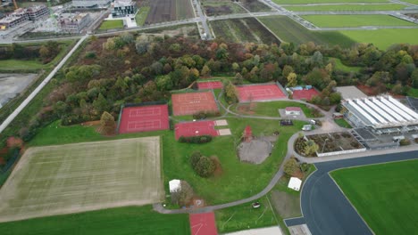 aerial view of empty red courts at sports facility in augsburg