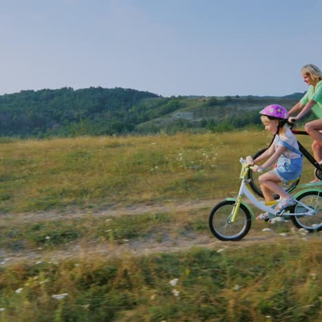 A-woman-and-a-child-ride-bicycles-5