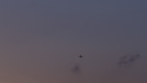 airplane in the twilight sky