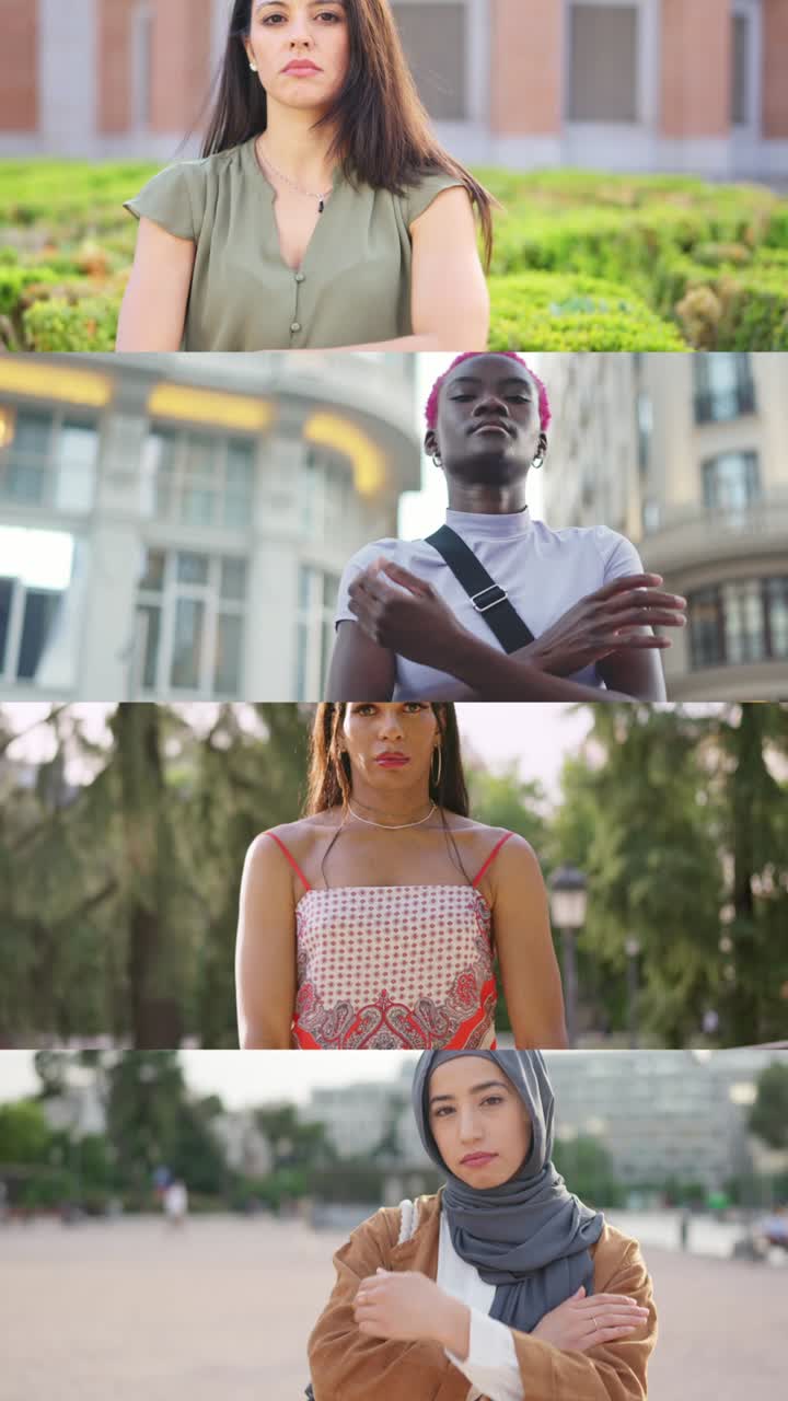 Diverse group of serious women with arms crossed outdoors