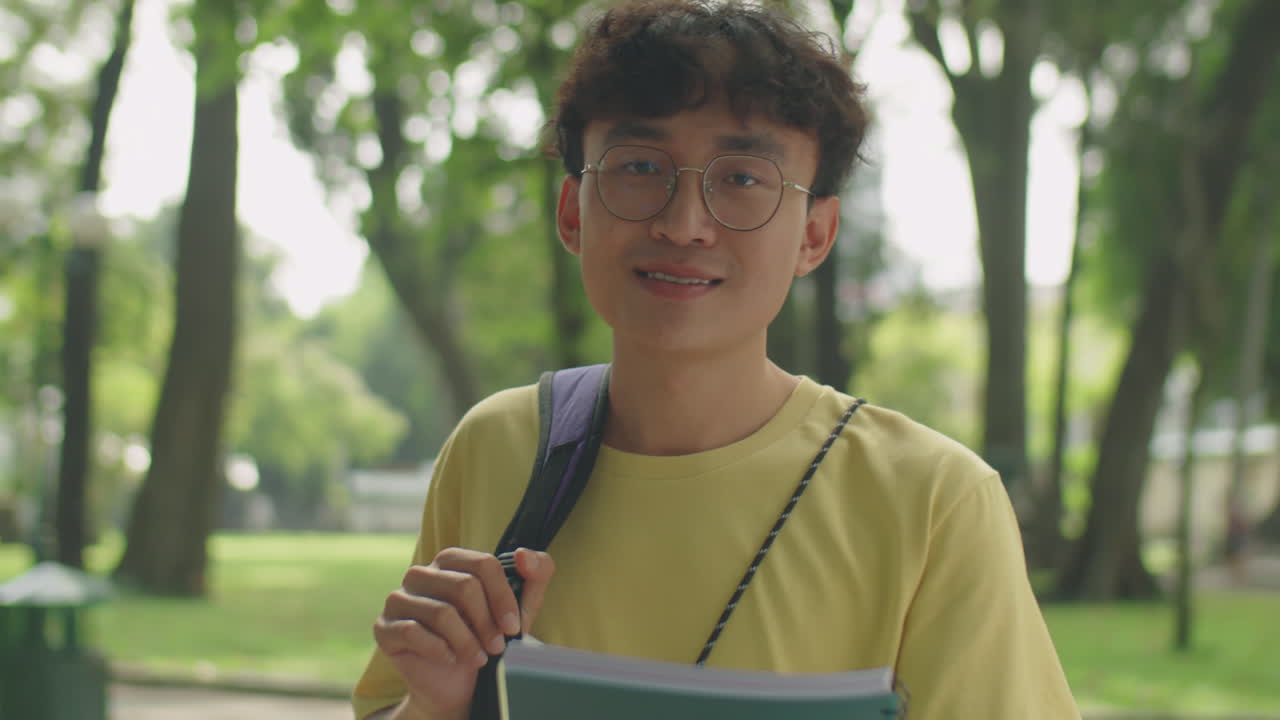 Portrait of Asian College Student in Park