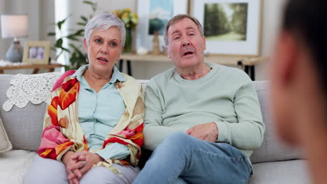 Senior-couple-on-couch,-therapy-with-doctor