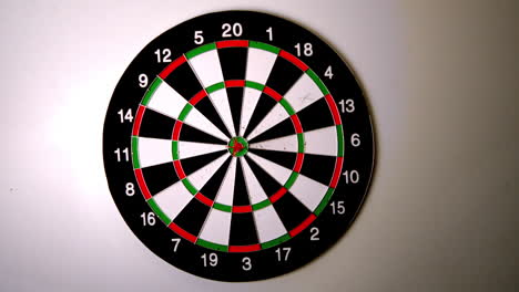 Dart-hitting-a-bulls-eye-on-dart-board