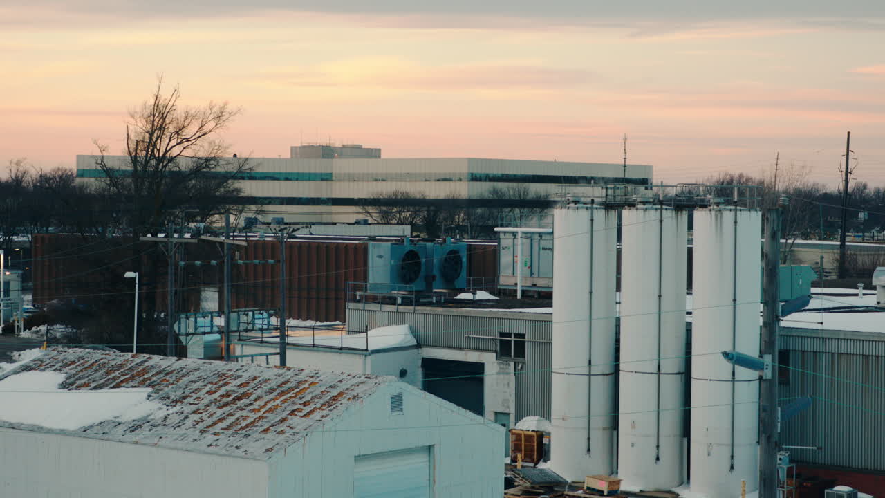 Midwest Industrial building covered in snow at sunset
