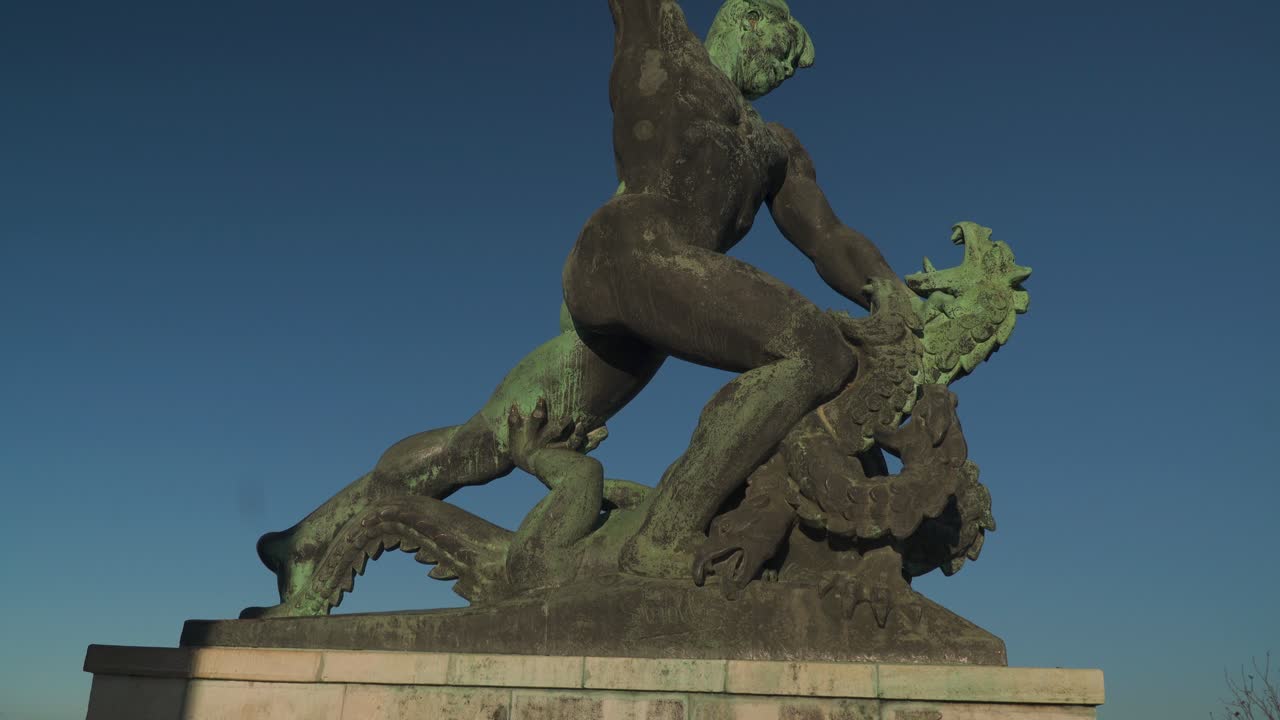 The old and stained Liberty Statue in Budapest - tilt up