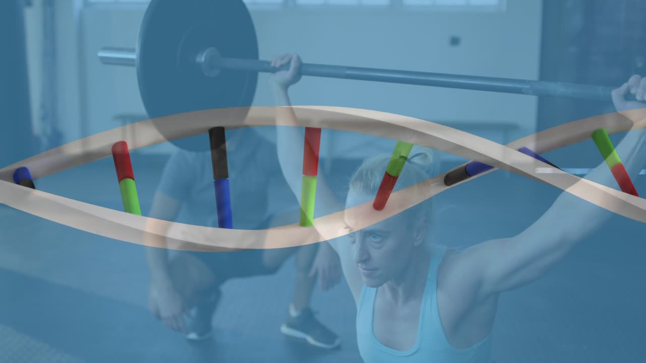 Fitness lifter lifting overhead barbell 3D pegs forming coil over torso showing form coach spotting