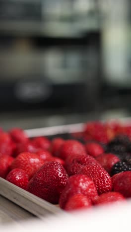 close-up of fresh strawberries and blackberries