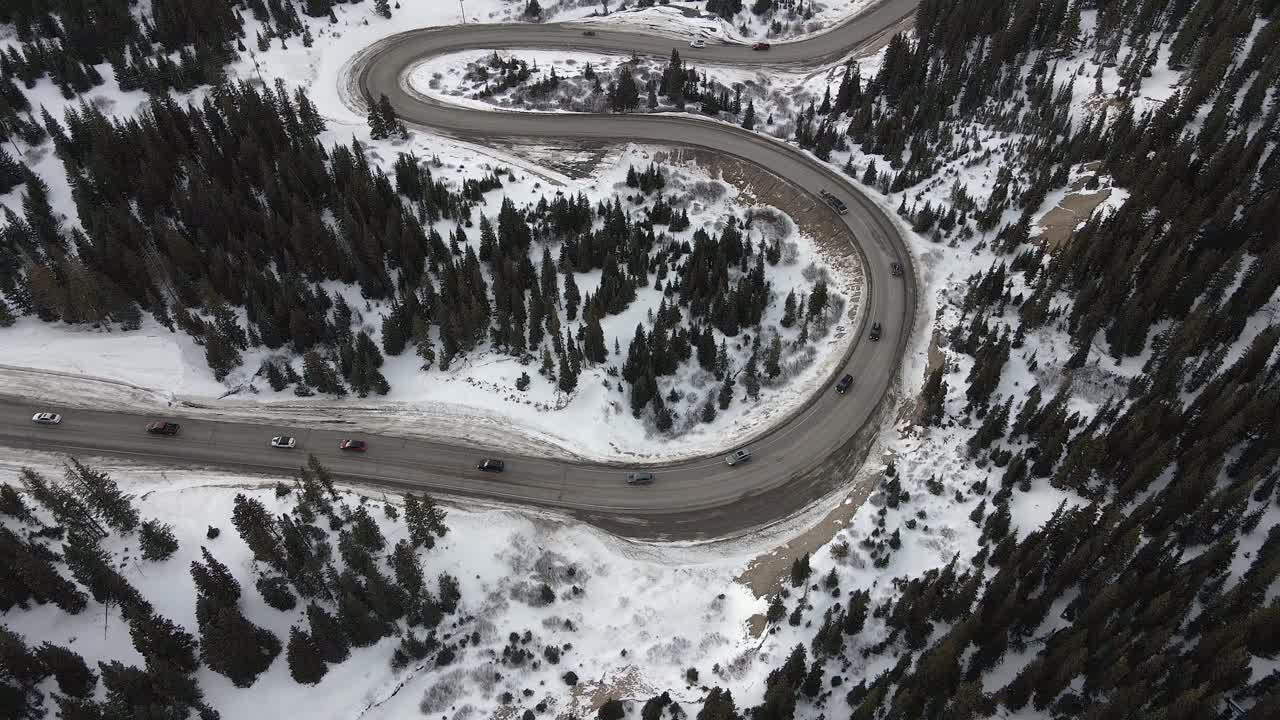 Top down view of traffic driving along the switchbacks of Highway 9 at sunset