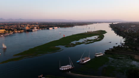 felucca navigating waters of nile with passengers