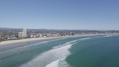 Aerial-View-Of-Palm-Beach-Suburb-and-Ocean-Coastline-In-Queensland,-Australia---drone-shot