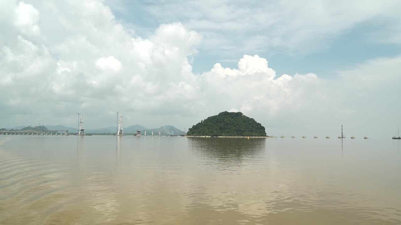 Batang Lupar Sarawak River Ferry Ride View During Summer And Under Construction Longest Bridge Conecting From each side,Sarawak,Borneo.