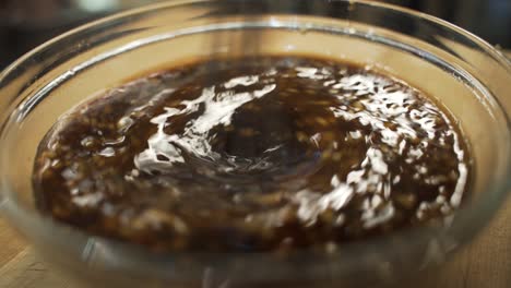 The cook is whisking this sauce that is sweet and aromatic. It is ready to be served and be used as a dipping sauce.
