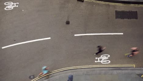 sped up timelapse birds eye view of runners on street