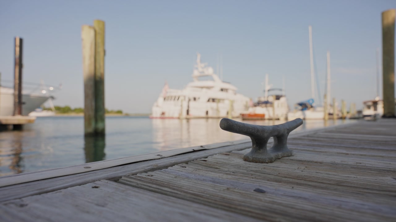 Boats line the downtown Beaufort waterfront docks along Taylor’s Creek, showcasing the historic charm and maritime character of coastal North Carolina.